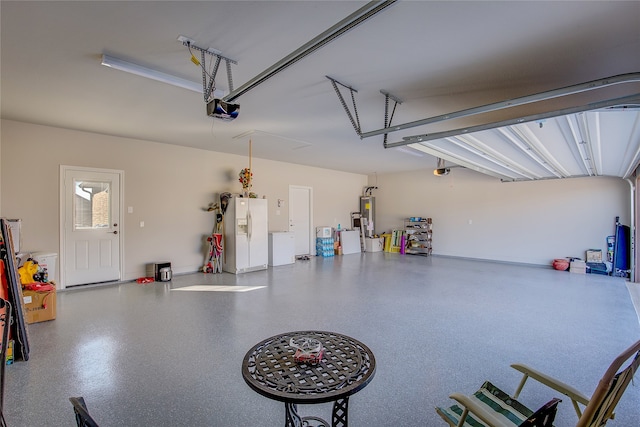 garage featuring a garage door opener, white refrigerator with ice dispenser, and water heater