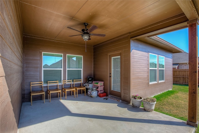 view of patio / terrace featuring ceiling fan