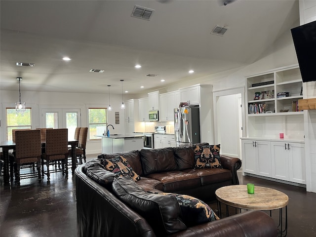 living room featuring sink