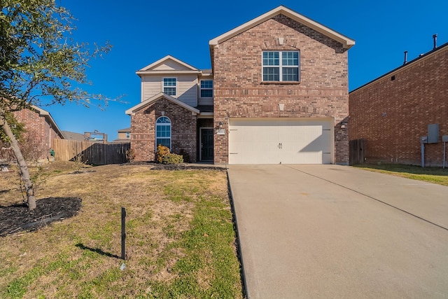 view of front property with a garage and a front lawn