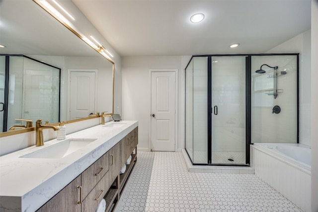 bathroom featuring plus walk in shower and vanity