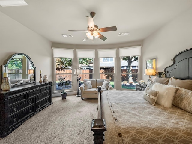 bedroom with ceiling fan and carpet