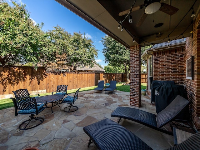 view of patio / terrace featuring grilling area and ceiling fan