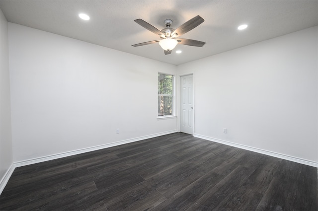 empty room with dark wood-style floors, ceiling fan, baseboards, and recessed lighting