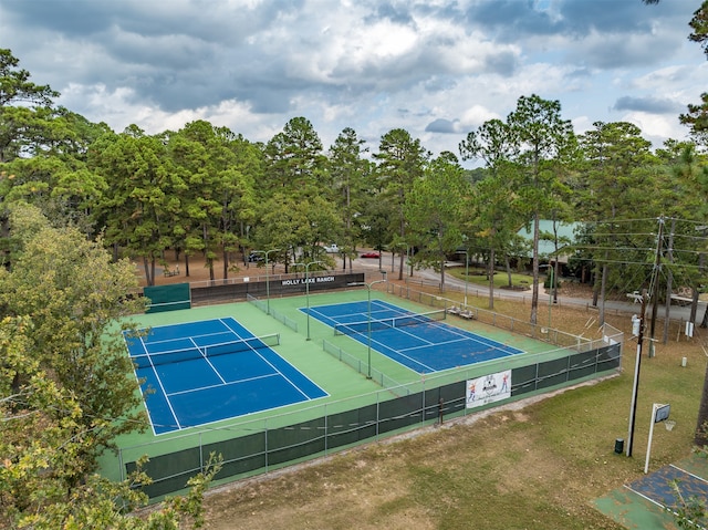 view of sport court featuring basketball hoop