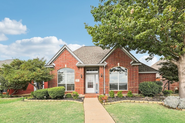 view of property with a front lawn