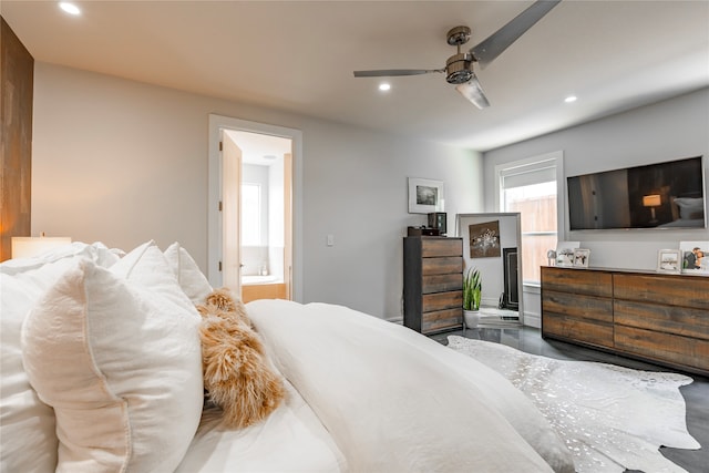 bedroom with connected bathroom and ceiling fan