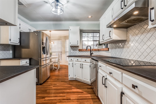 kitchen with appliances with stainless steel finishes, white cabinets, sink, and dark hardwood / wood-style flooring