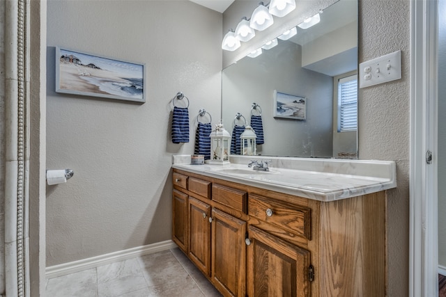 bathroom with vanity and tile patterned flooring