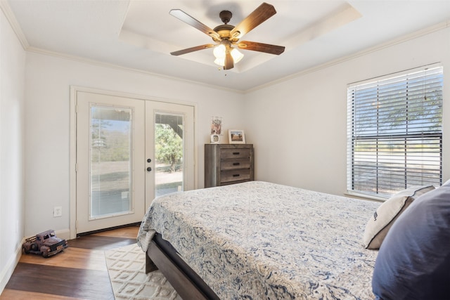 bedroom with french doors, ornamental molding, access to exterior, hardwood / wood-style flooring, and ceiling fan