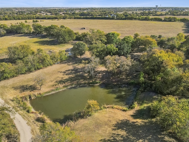 aerial view with a rural view and a water view