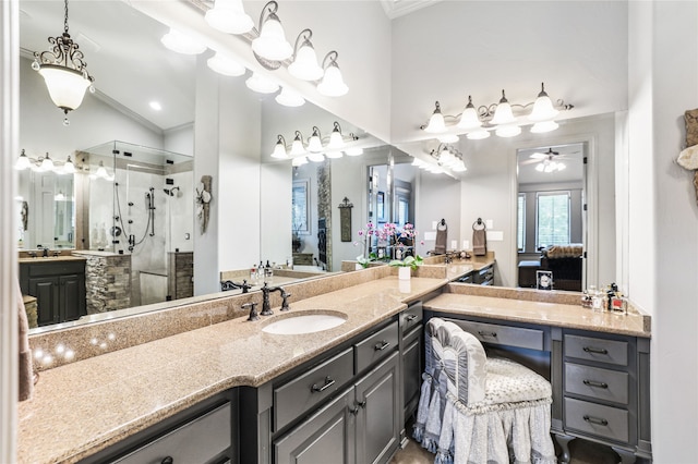 bathroom featuring vanity, ornamental molding, walk in shower, and ceiling fan