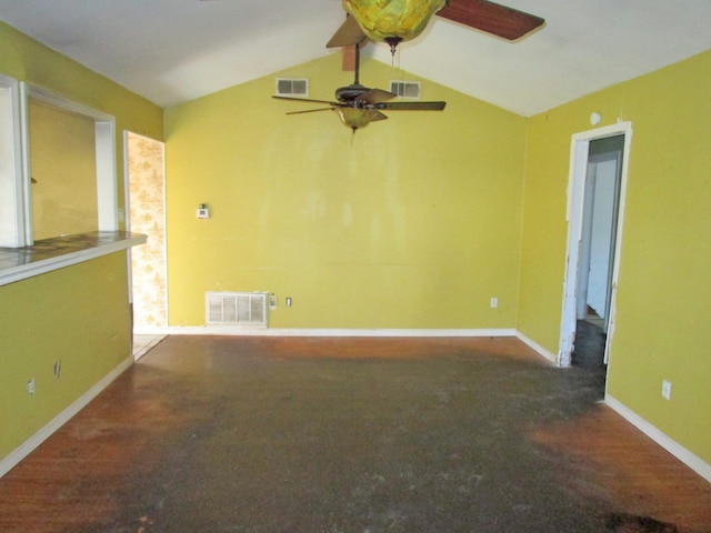 carpeted spare room with ceiling fan and lofted ceiling