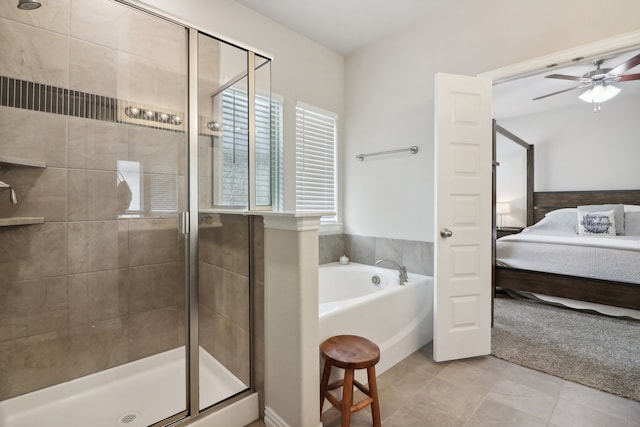 bathroom with ceiling fan, independent shower and bath, and tile patterned flooring