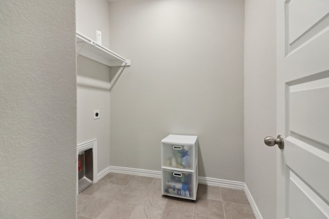 laundry area with electric dryer hookup