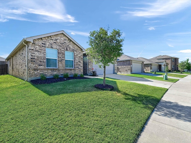 single story home with a front yard and a garage