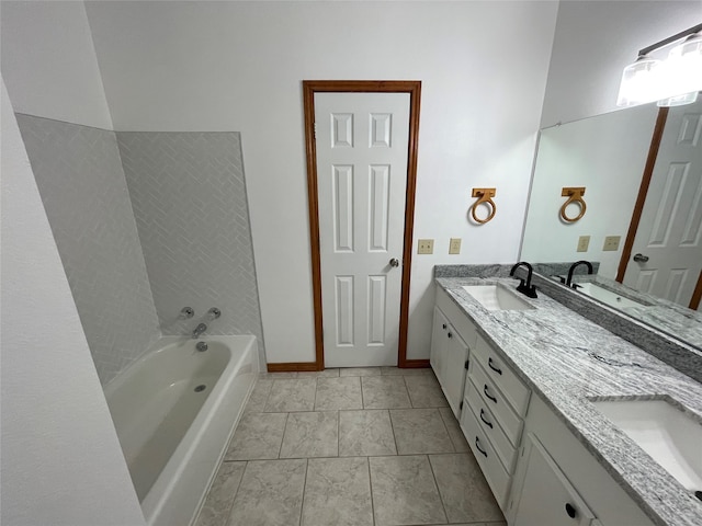 bathroom featuring vanity and a bathtub