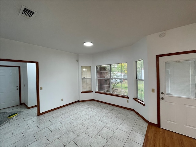 foyer with light hardwood / wood-style floors