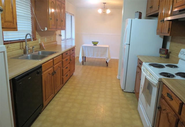 kitchen with black dishwasher, sink, electric range, exhaust hood, and a chandelier