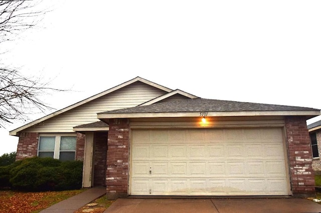 single story home with a garage