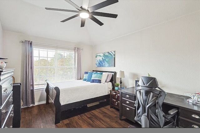 bedroom featuring lofted ceiling, dark wood-type flooring, and ceiling fan