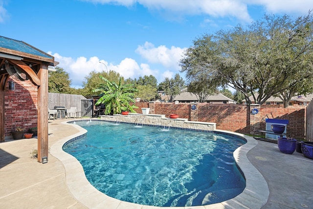 view of pool featuring a patio and pool water feature