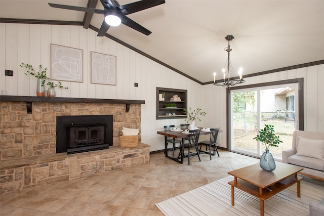 living room featuring vaulted ceiling with beams, wood walls, crown molding, and ceiling fan with notable chandelier