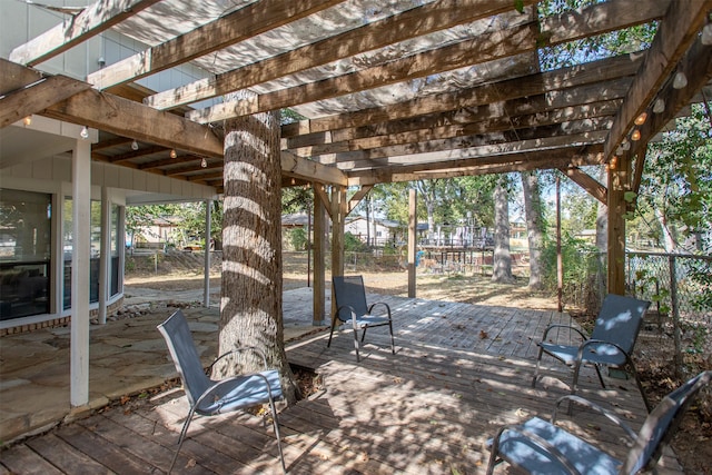 view of patio / terrace featuring a pergola and a wooden deck