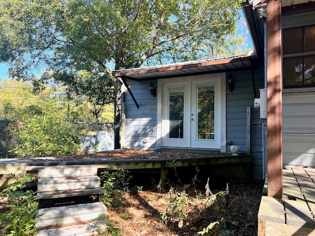 property entrance featuring french doors and a deck