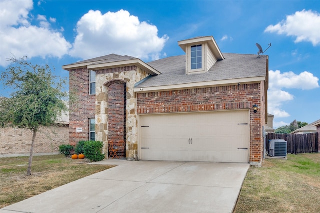 2209 Torch Lake Dr, Forney, TX 75126 - view of front of property featuring fence, brick siding, a garage, concrete driveway, and central air condition unit