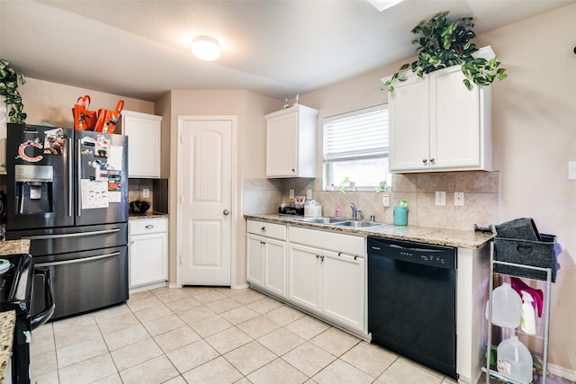 kitchen featuring black appliances, sink, and white cabinets