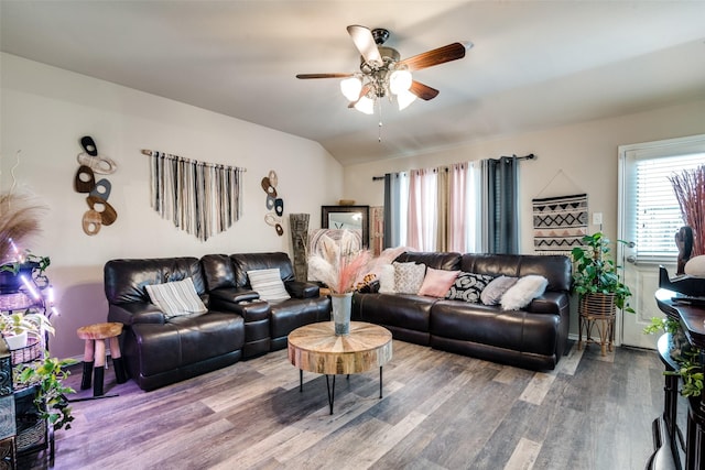 2209 Torch Lake Dr, Forney, TX 75126 - living area with a healthy amount of sunlight, a ceiling fan, wood finished floors, and lofted ceiling