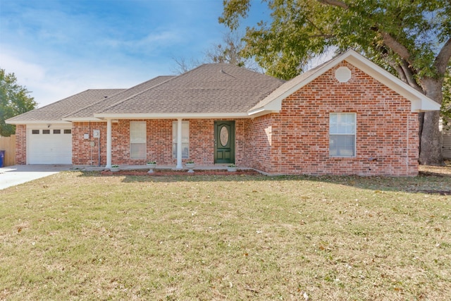 ranch-style home featuring a garage and a front lawn