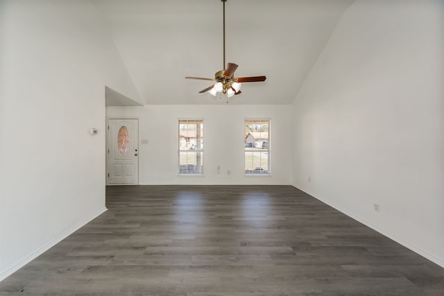 empty room featuring ceiling fan, high vaulted ceiling, and dark hardwood / wood-style flooring