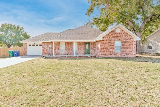 ranch-style home with a garage and a front lawn