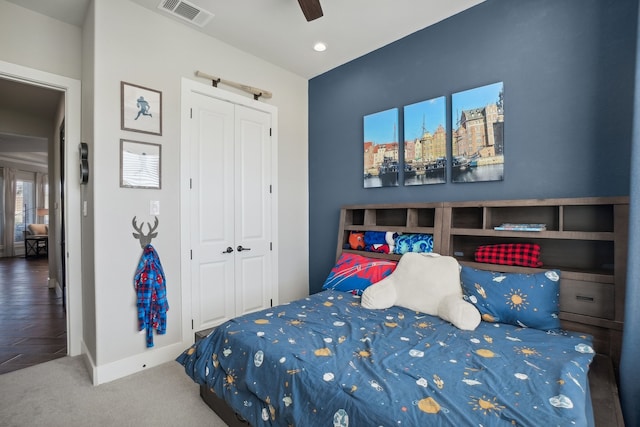 bedroom featuring carpet, a closet, and ceiling fan