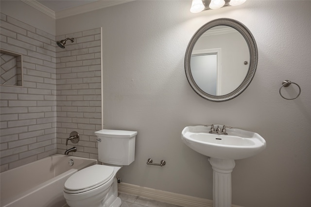 bathroom with toilet, tiled shower / bath combo, ornamental molding, and tile patterned flooring