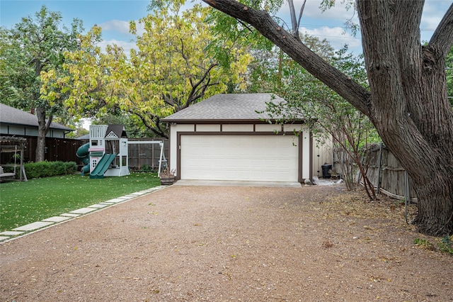 garage with a lawn