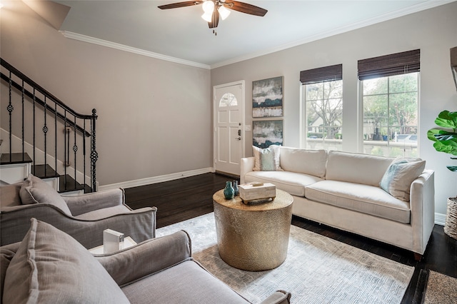 living room with hardwood / wood-style floors, crown molding, and ceiling fan