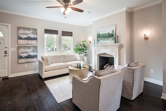 living room with a premium fireplace, ornamental molding, ceiling fan, and dark hardwood / wood-style flooring