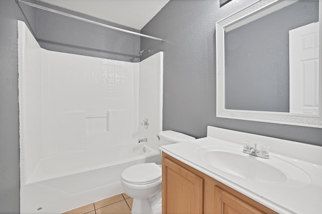 full bathroom featuring toilet, bathtub / shower combination, vanity, and tile patterned flooring