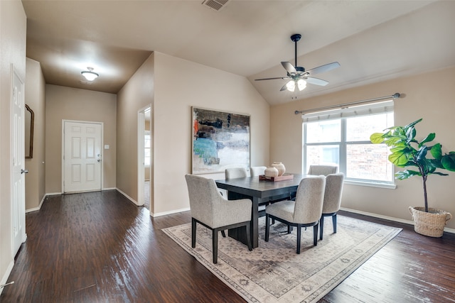 dining room featuring dark wood-type flooring, ceiling fan, and lofted ceiling