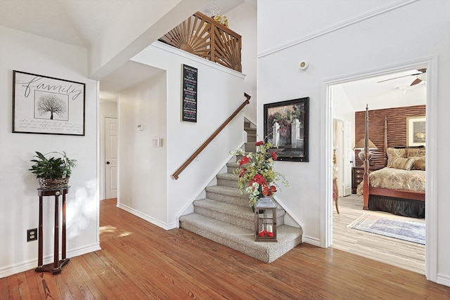 entryway with hardwood / wood-style flooring