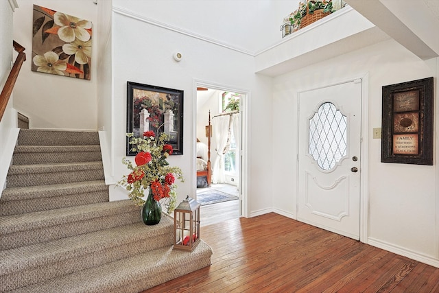 entryway with wood-type flooring