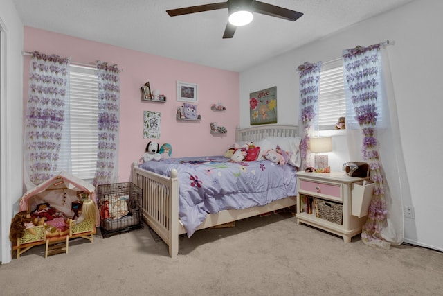 bedroom with ceiling fan and carpet