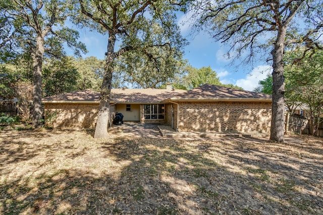 back of house featuring a patio