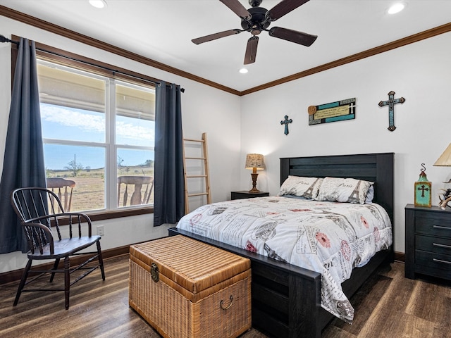 bedroom featuring dark hardwood / wood-style flooring, crown molding, and ceiling fan