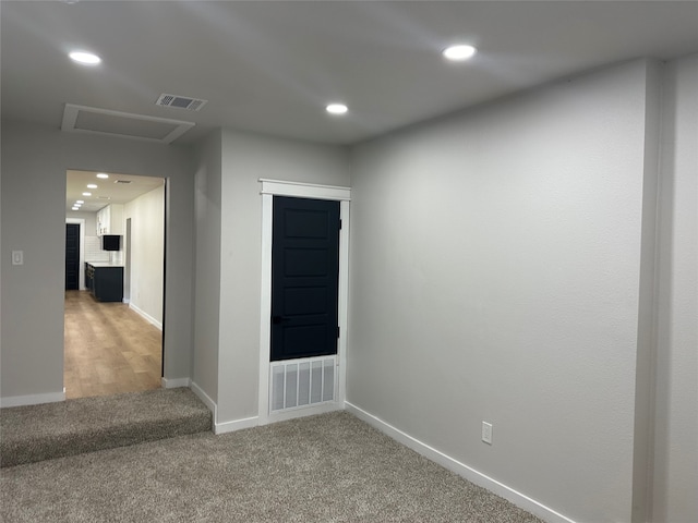 spare room featuring carpet flooring