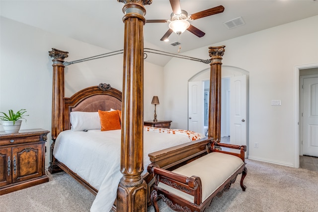 carpeted bedroom featuring ceiling fan and vaulted ceiling