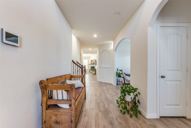 hall with light wood-type flooring